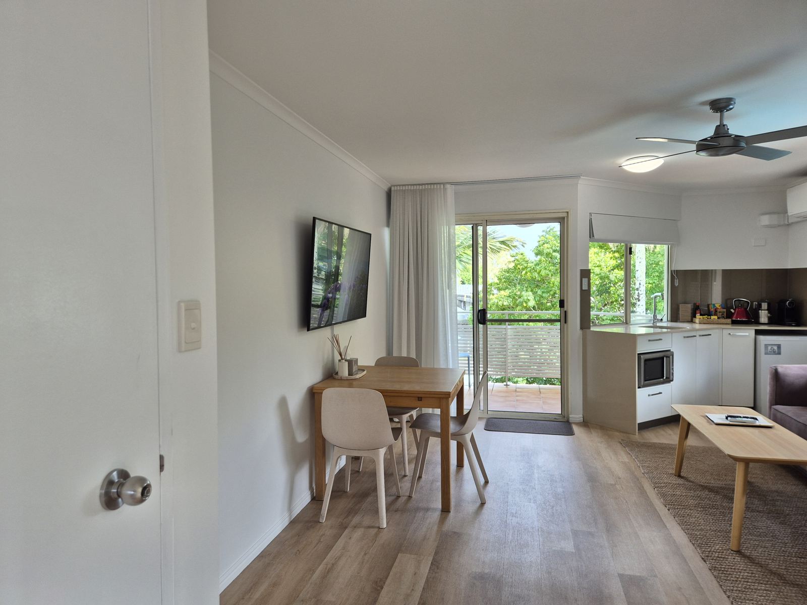 View from the front door across the living area to the balcony